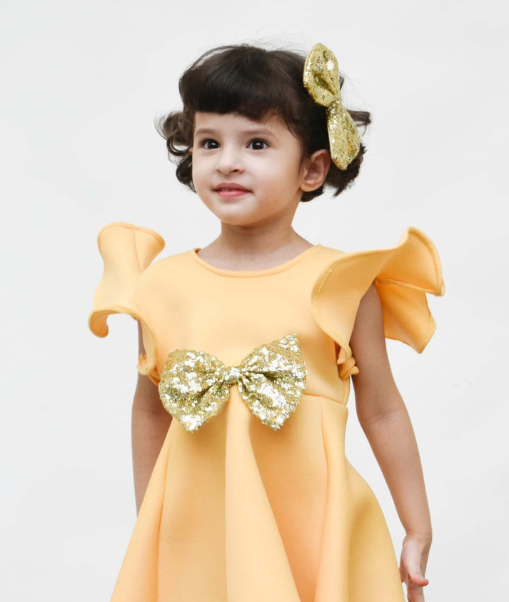 Manufactured by FAYON KIDS (Noida, U.P) Golden Glitter Bow Clip