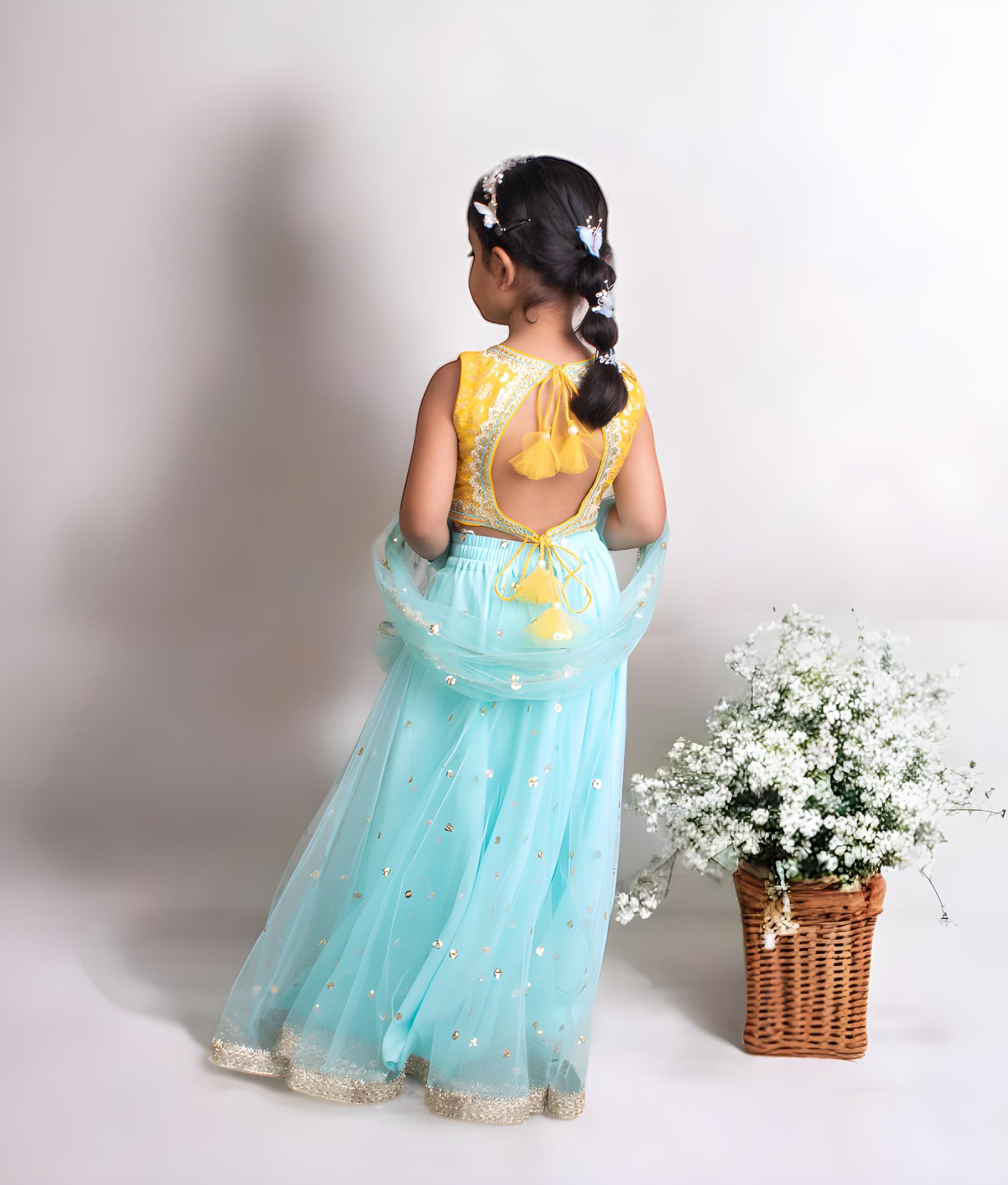 Manufactured by FAYON KIDS (Noida, U.P) Yellow Brocade Choli with Blue Lehenga