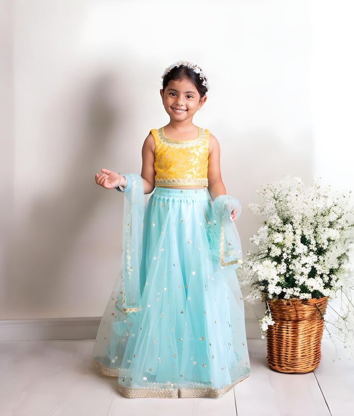 Manufactured by FAYON KIDS (Noida, U.P) Yellow Brocade Choli with Blue Lehenga