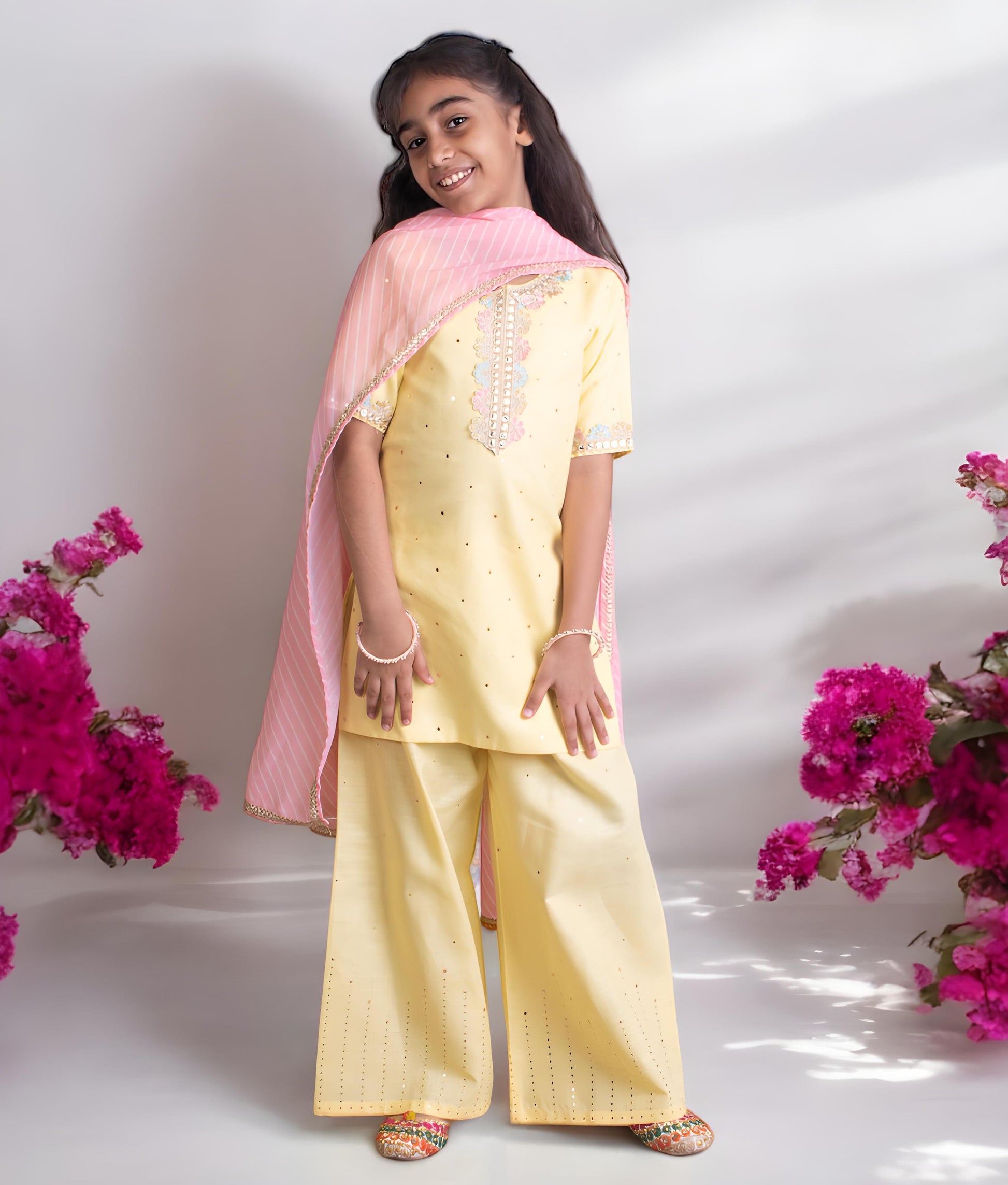 Manufactured by FAYON KIDS (Noida, U.P) Yellow Faux Mukaish Work Kurti Sharara Set