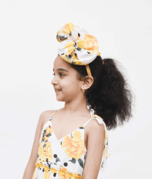 Manufactured by FAYON KIDS (Noida, U.P) Yellow Printed Twirls Hairband for Girls